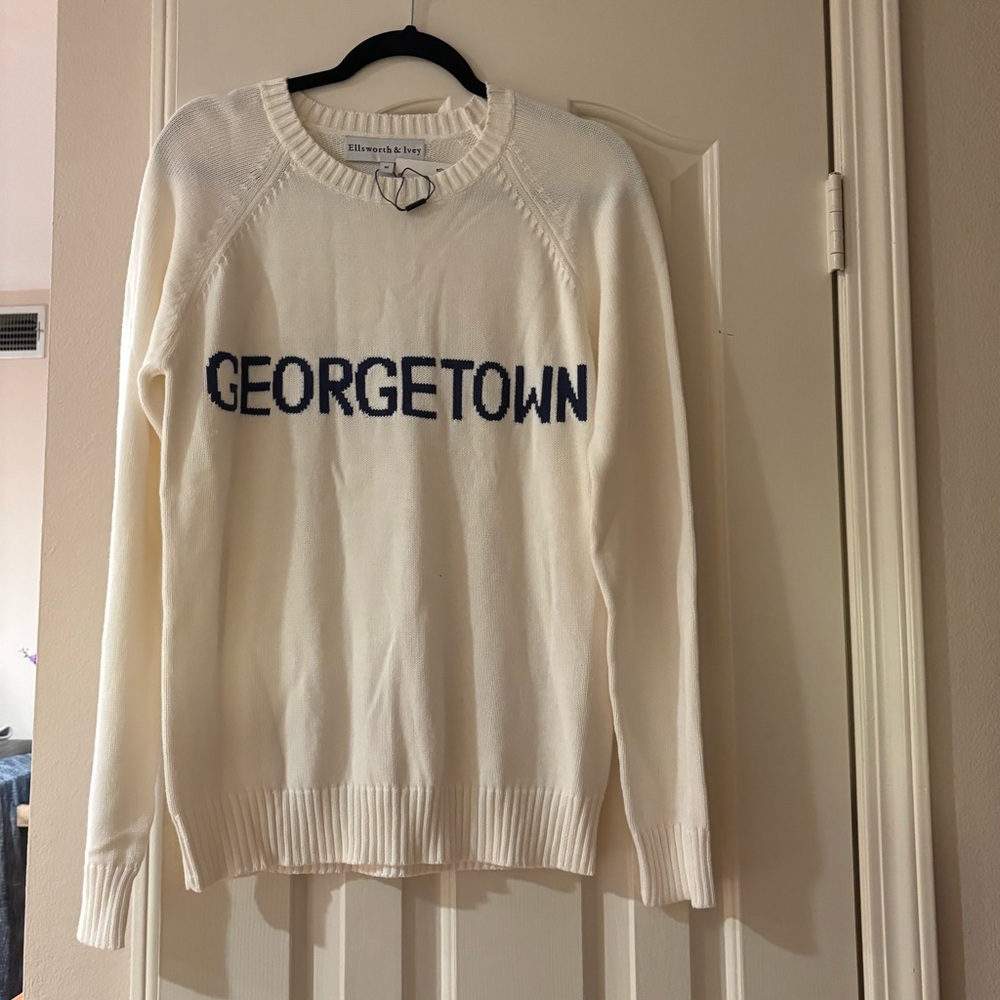 Beautiful light sweater. Brand new with tags.